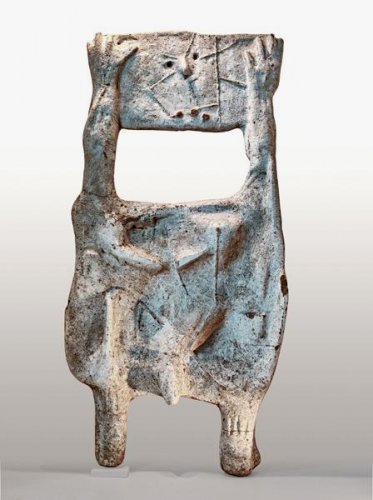 Standing Figure Holding Head - Details Standing Figure Holding Head - Details