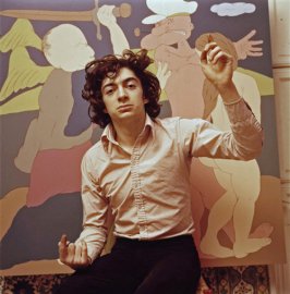 Philippe Mora with his painting
<br />'Popeye and Olive's Expulsion from
<br />Paradise' which was used in the Beatles
<br />Illustrated Lyrics, the cartoon couple
<br />standing in for John and Yoko.
<br />Photographed at the Pheasantry, London,
<br />by Angus Forbes in 1970 - image