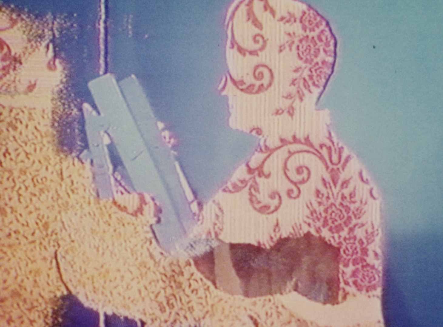 Film still from 'Faded Wallpaper' by Tina Keane