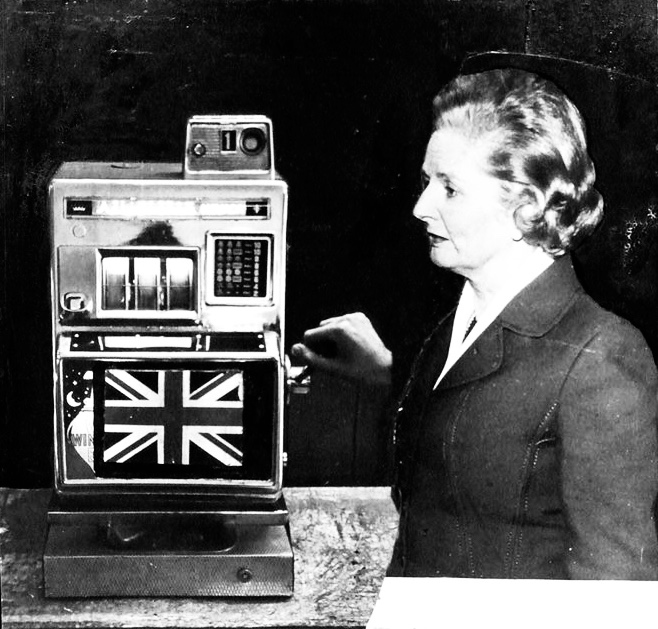 w Maggie Gambles Britain Peter Kennard: Maggie Gambles Britain, 1983.